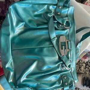 Metallic mint green hobo bag